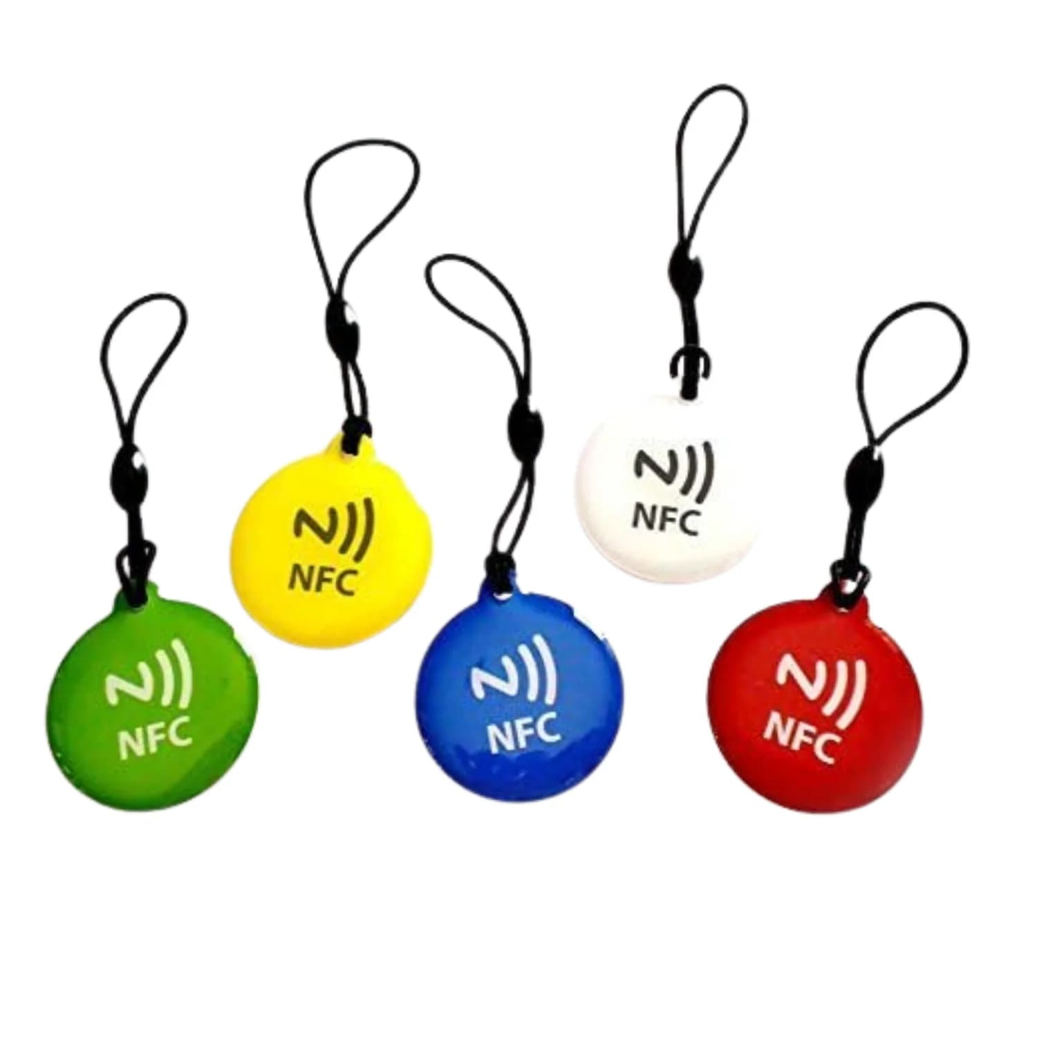 Five colorful round NFC keychain tags in green, yellow, blue, white, and red with black loops.