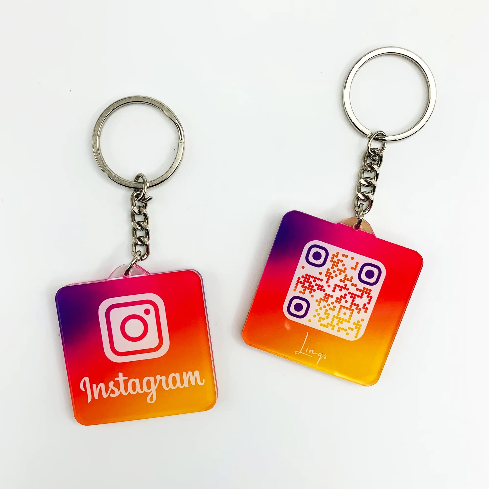 Square keychain with Instagram logo and QR code on a gradient background.