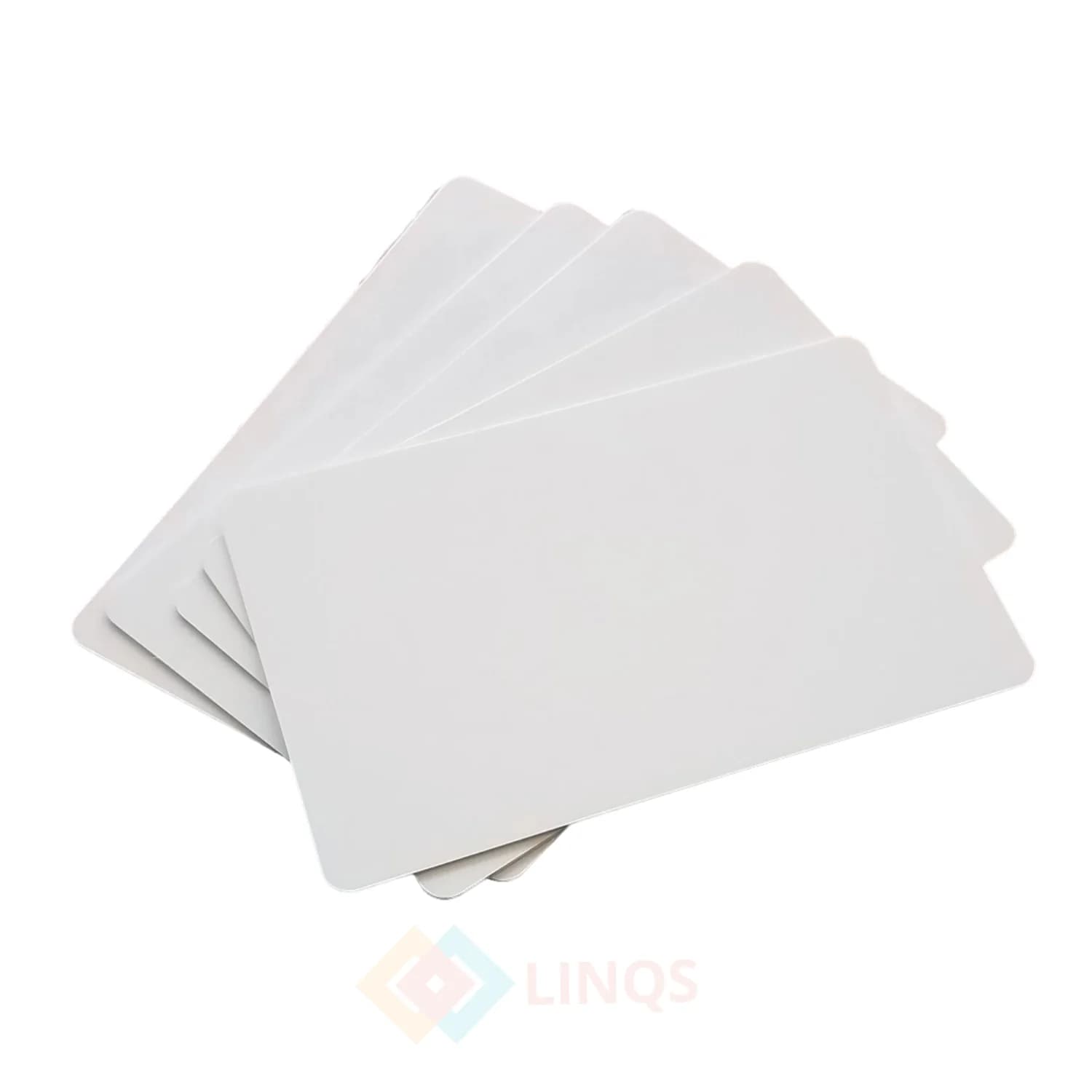 A fan of blank white PVC cards with rounded corners on a white background.