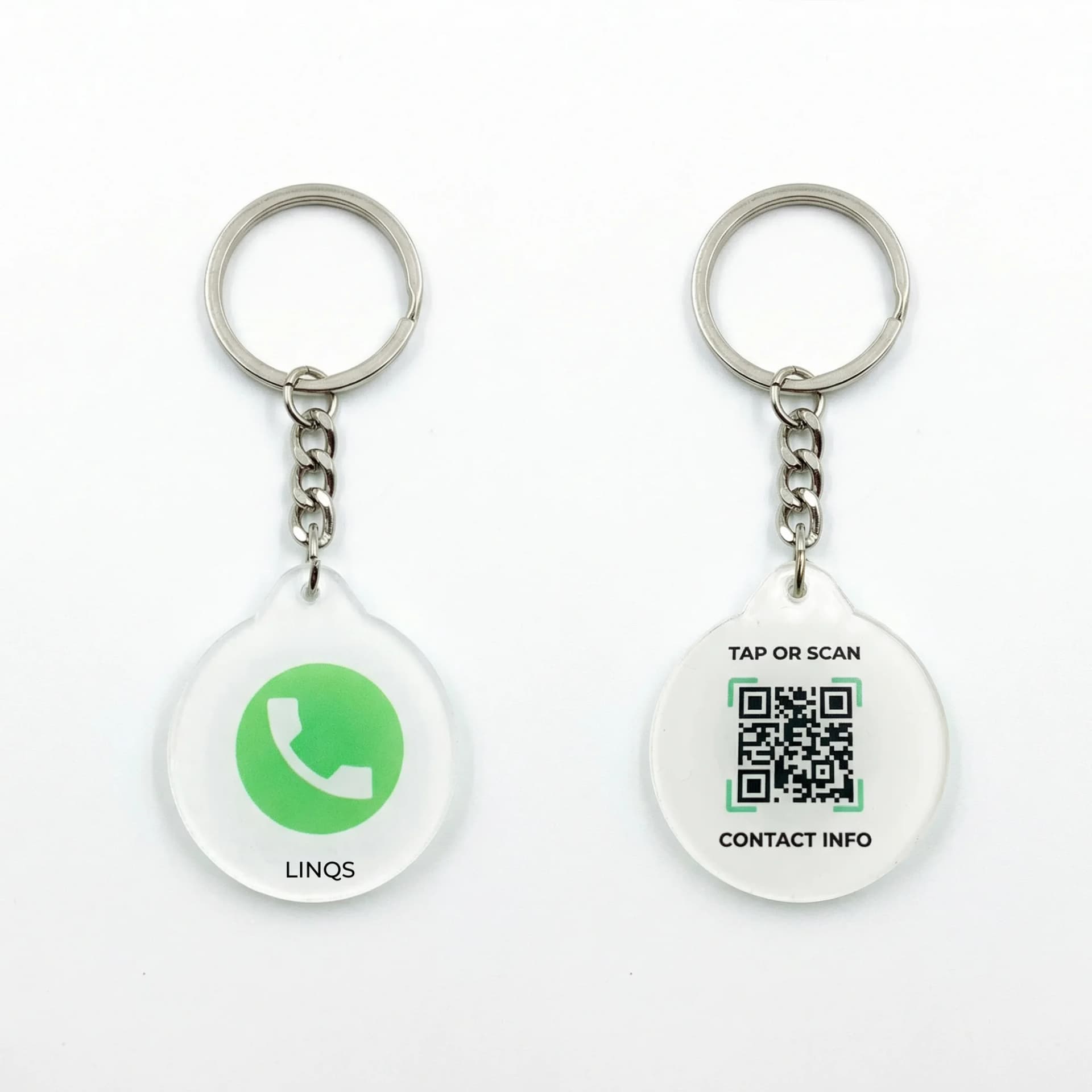 Two acrylic keychains with metal rings and chains, one displaying a green WhatsApp icon and the other showing a QR code with "TAP OR SCAN" and "CONTACT INFO" text.
